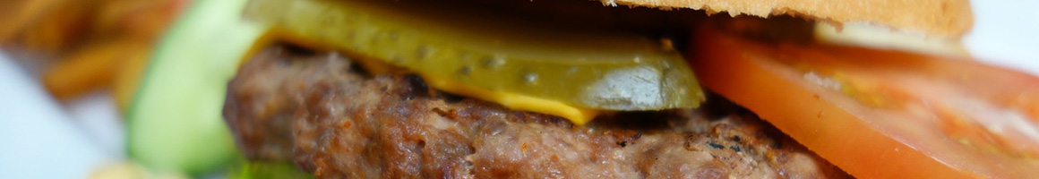 Eating American (Traditional) Burger at Burger Box restaurant in Bedford, TX.